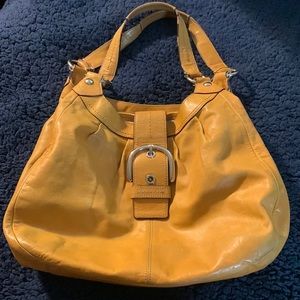 Purse with multiple compartments.